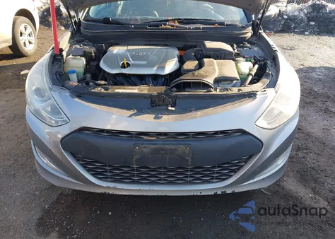 2013 Hyundai Sonata Hybrid z USA, uszkodzony, nr VIN KMHEC4A42DA065398